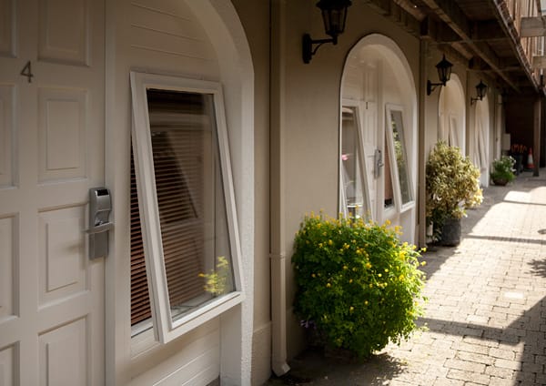 Room doors opening onto the courtyard