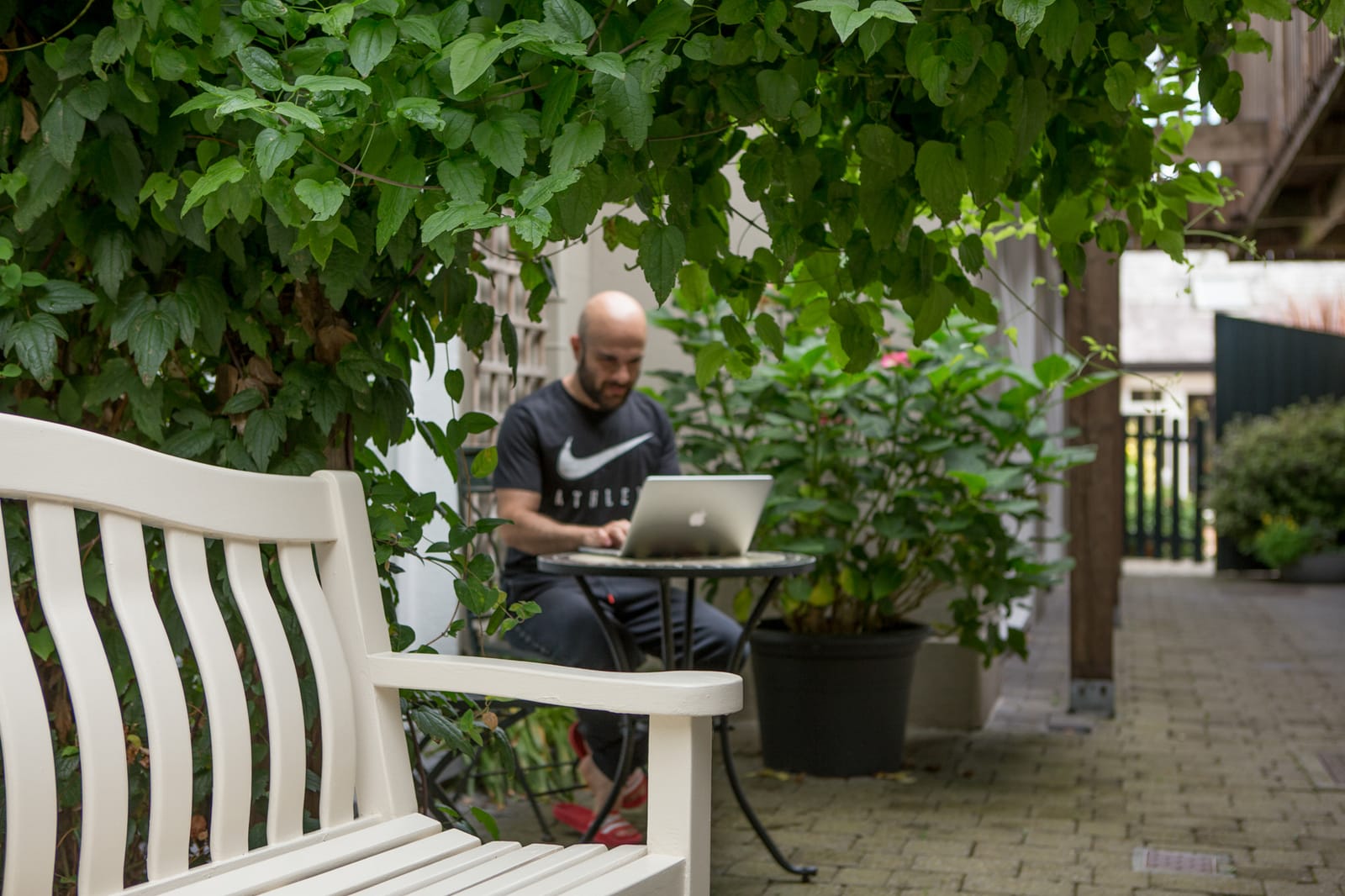 A guest relaxing in the courtyard