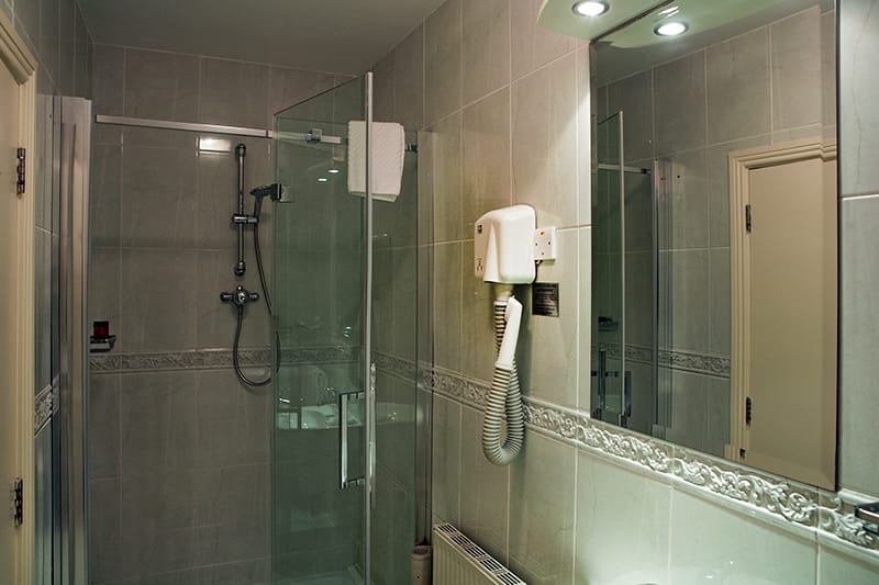 En suite bathroom with extra large power shower