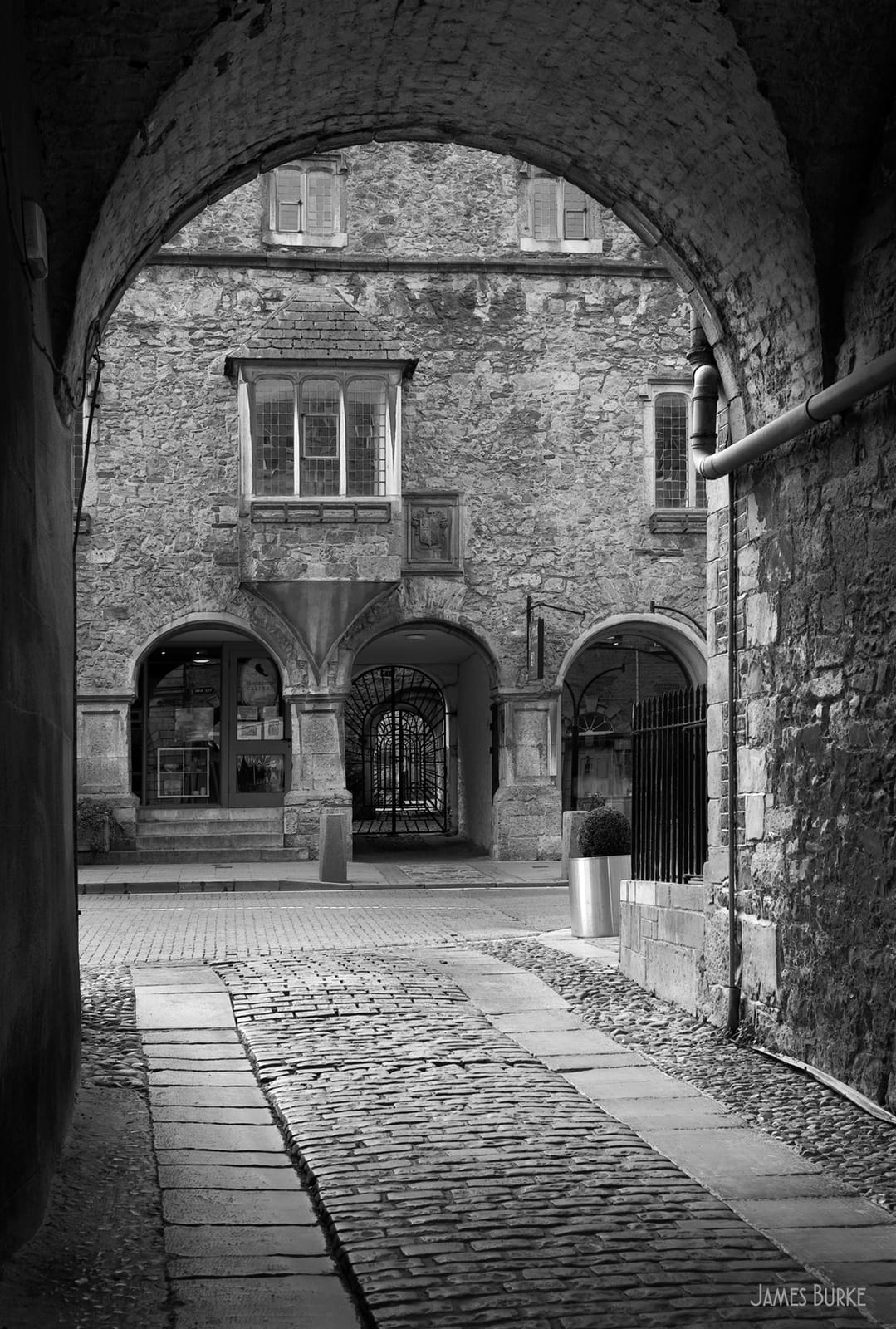 The restored stable arches of the old carriage house